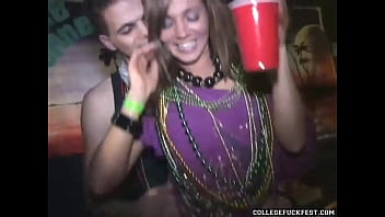 College girl engages in sexual activity with inexperienced partner during Mardi Gras